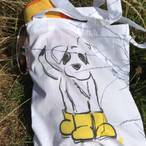 dog tote bag featuring illustration of Kit the dog in yellow wellies